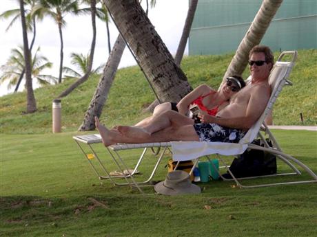 Chris and Ann lounging by the lagoon