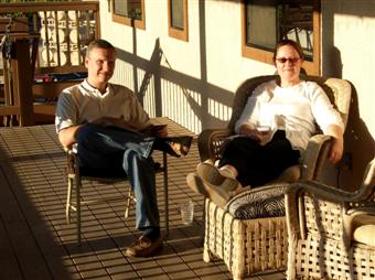 Relaxing on the deck of The Loft at Zenaida Cellars