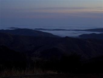 Fog rolling into the hills above Cambria