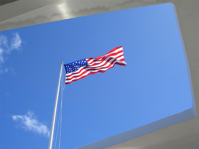 American flag over USS Arizona Memorial